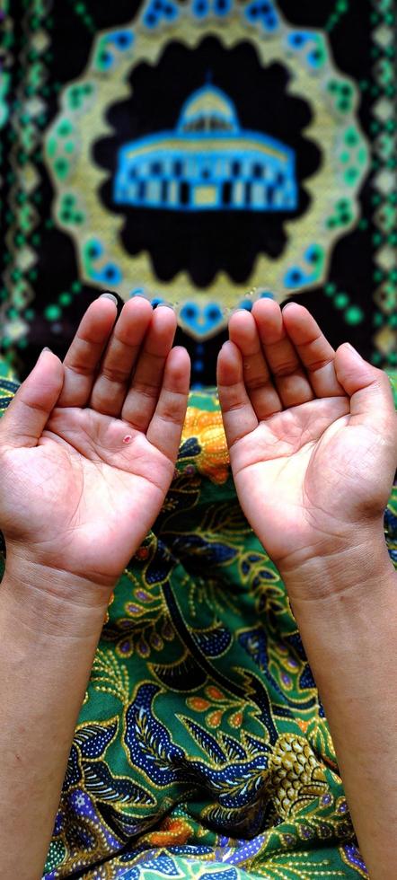 Hands that are holding up prayer photo