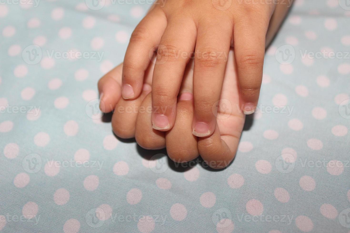 11 month old baby's nails are long, a small part of the nails are broken  and there is dirt because they haven't been clipped. 13901028 Stock Photo  at Vecteezy