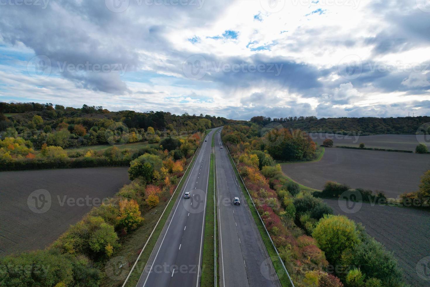 British Motorways, roads and highways passing through countryside of England. aerial view with drone's camera photo