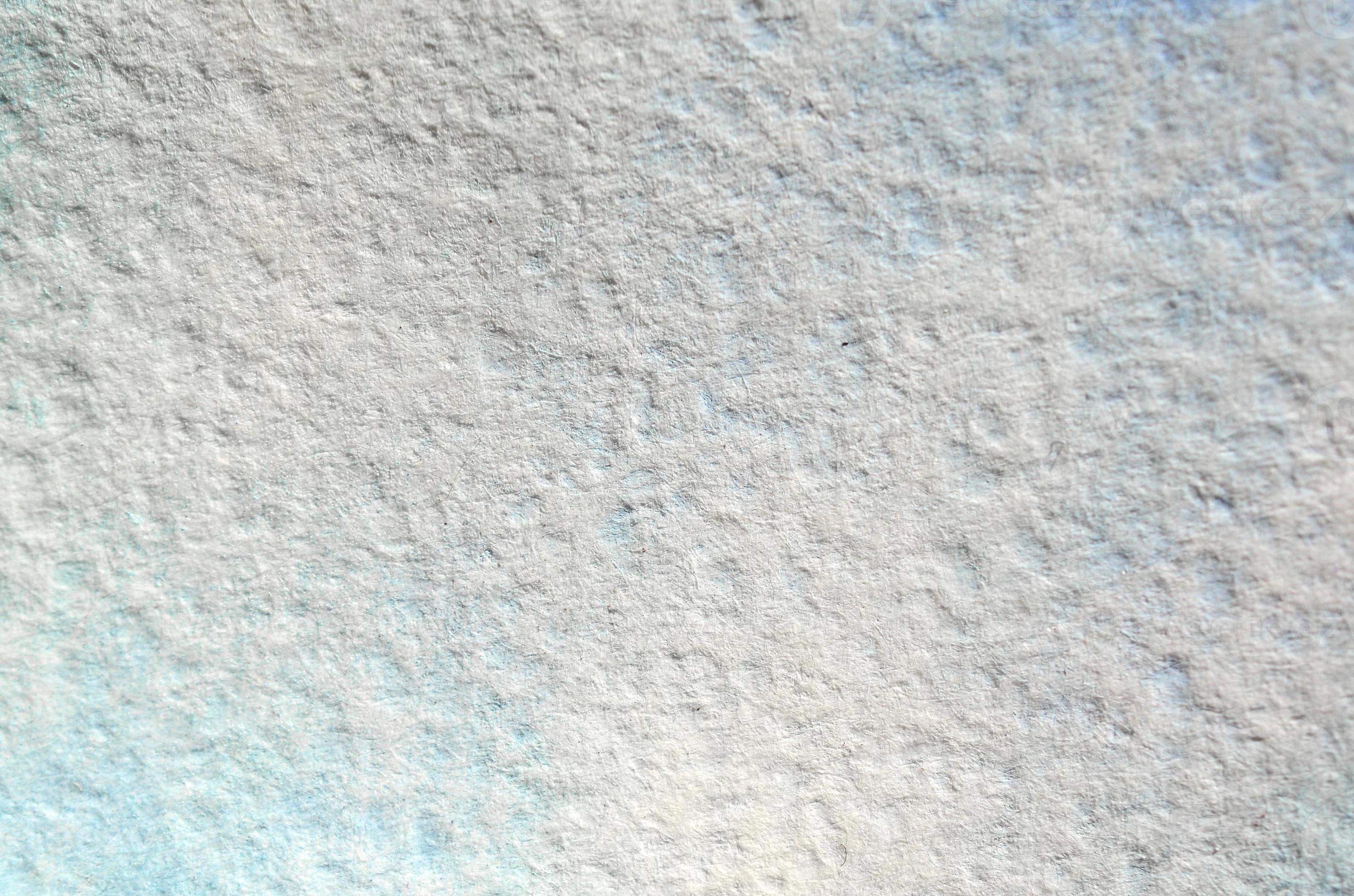 Texture of thick paper intended for watercolor painting. Macro snapshot of details of the relief