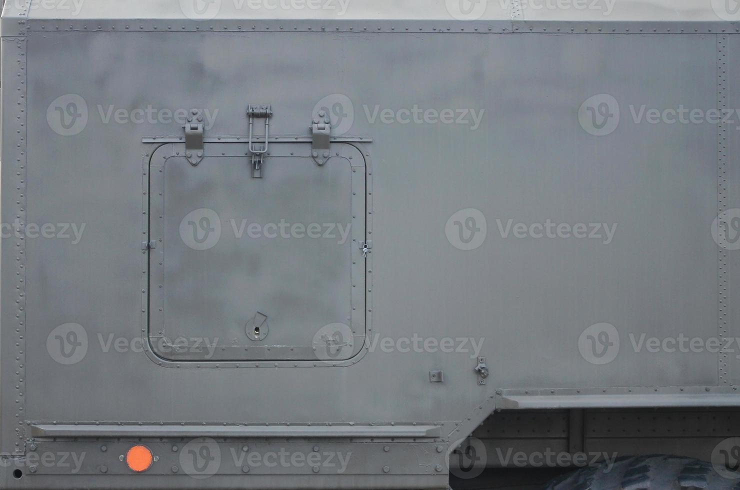 Close up of green military truck. Modern military transportation vehicle technologies photo