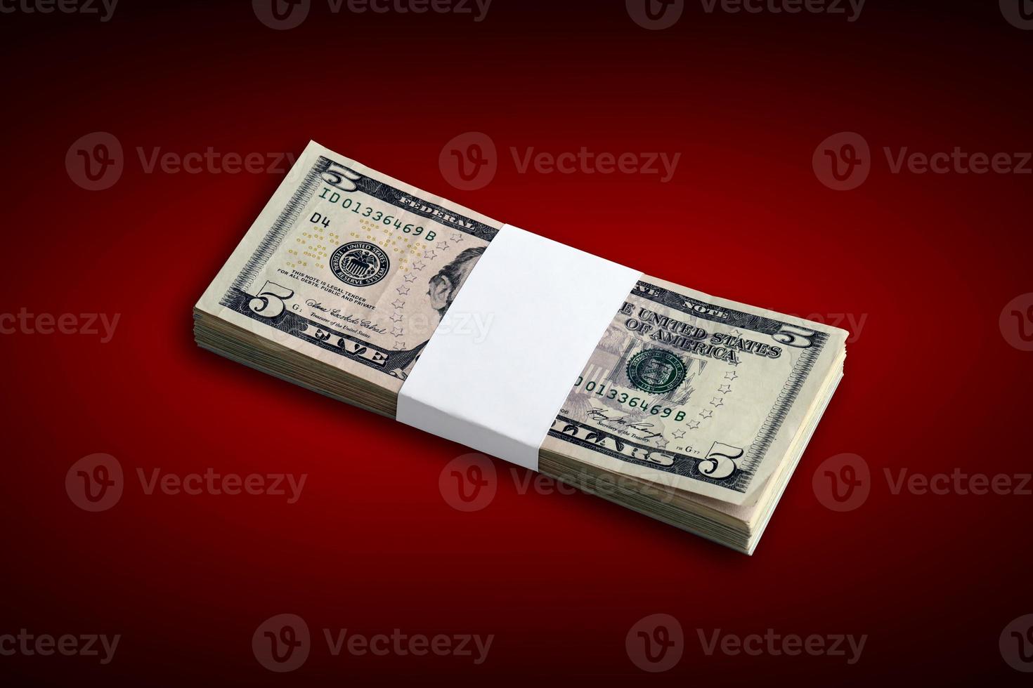 Bundle of US dollar bills isolated on white. Pack of american money with high resolution on perfect white background photo