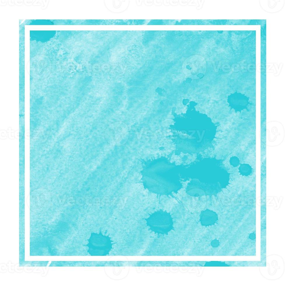 Light blue hand drawn watercolor rectangular frame background texture with stains photo