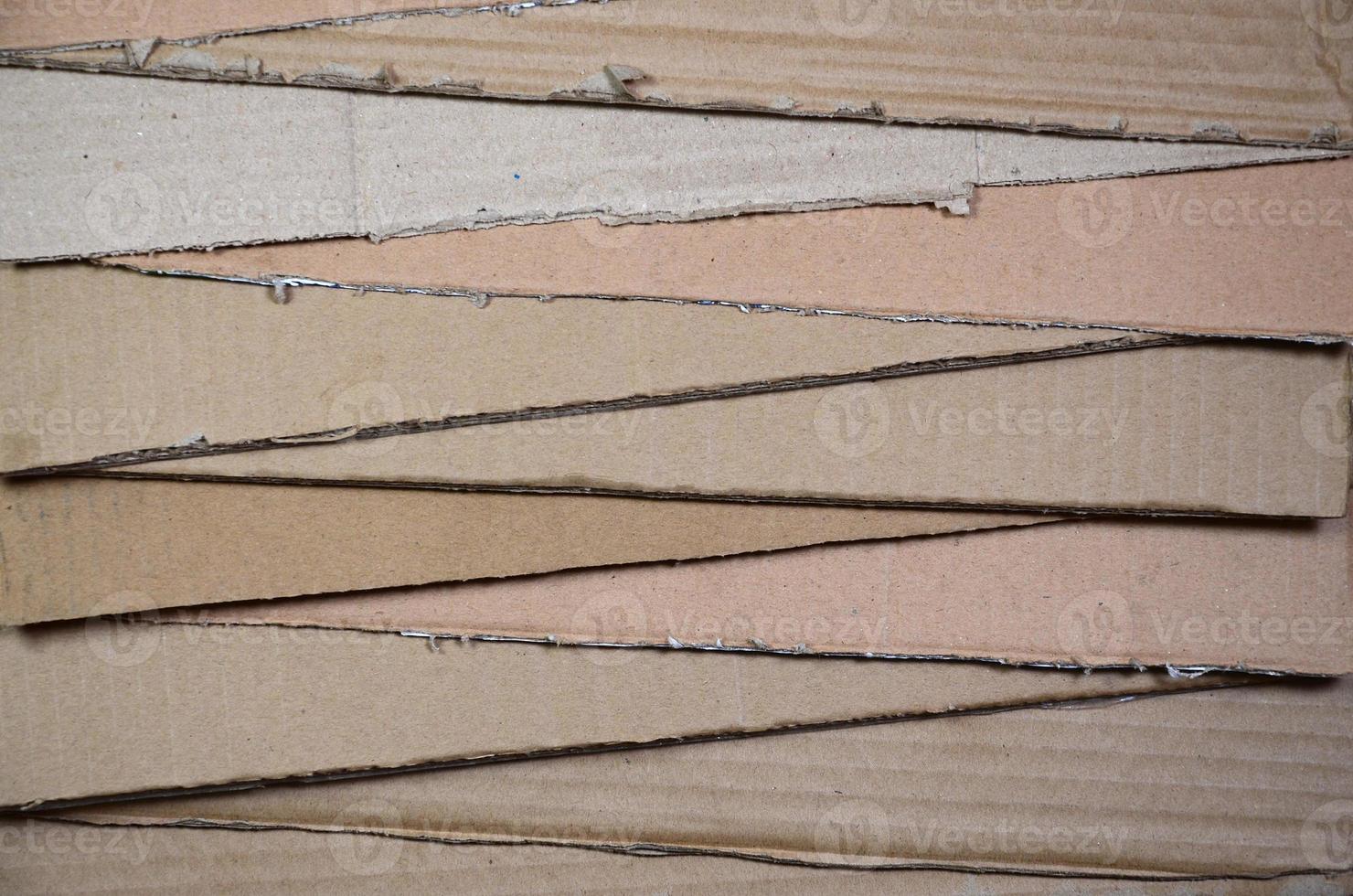 Background of paper textures piled ready to recycle. A pack of old office cardboard for recycling of waste paper. Pile of wastepaper photo
