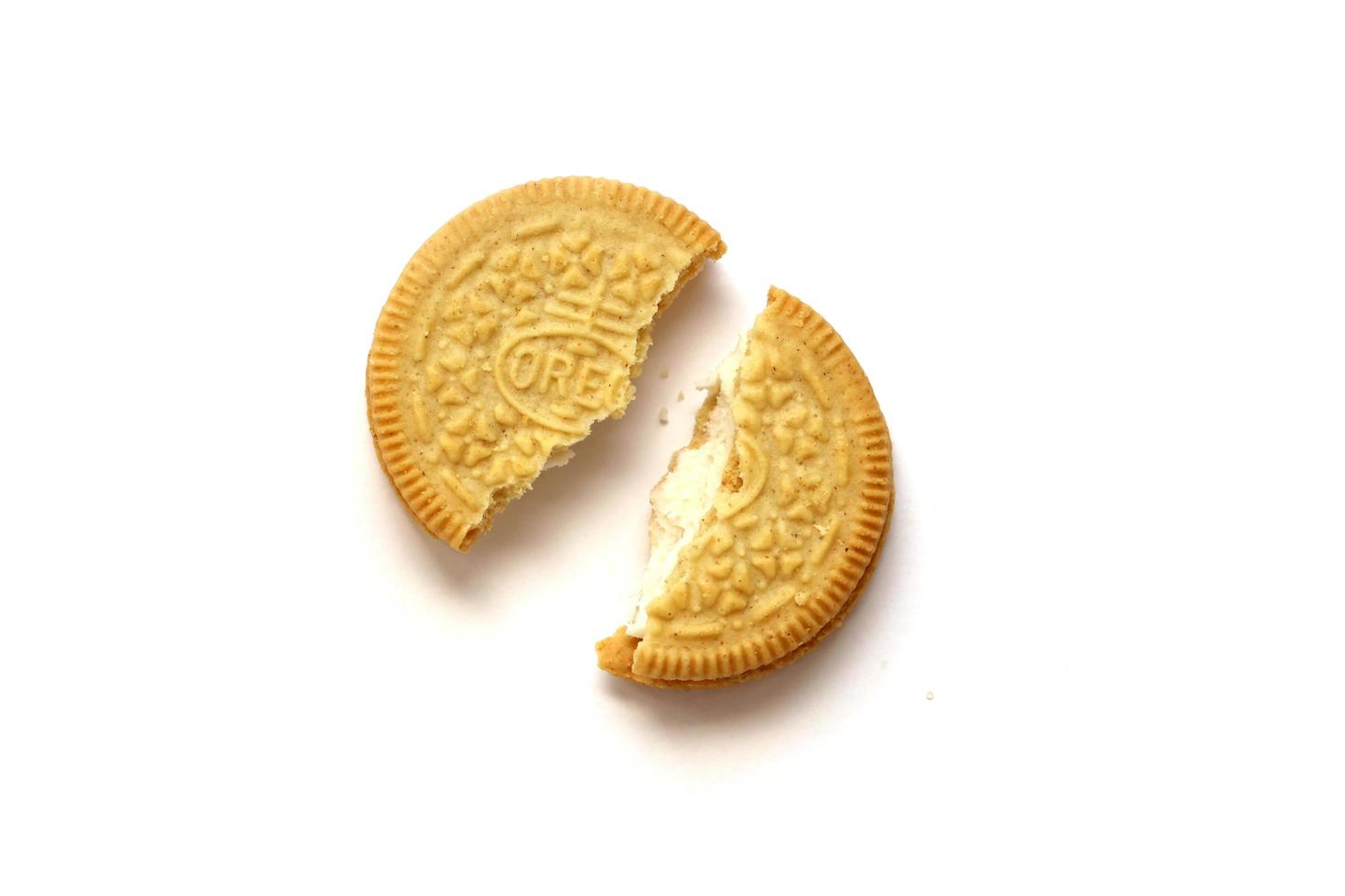 TERNOPIL, UKRAINE - MAY 28, 2022 Oreo golden crispy cookie on white background. The brand Oreo is owned by company Mondelez international photo