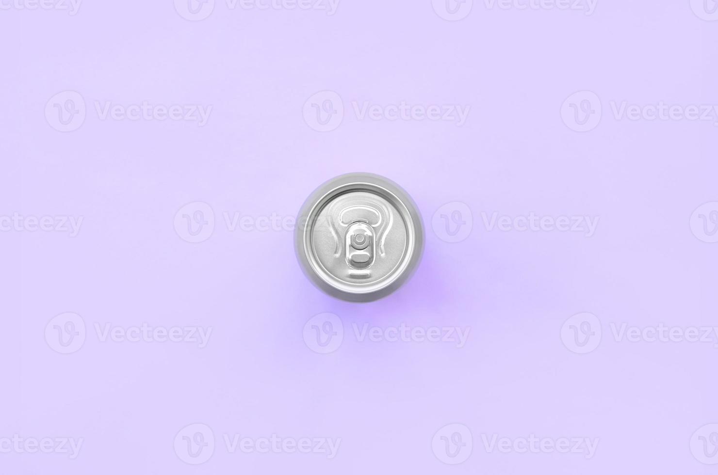 Metallic beer can on texture background of fashion pastel violet color paper in minimal concept photo