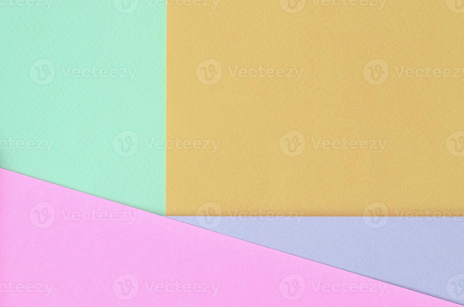 Texture background of fashion pastel colors. Pink, violet, orange and blue geometric pattern papers. photo
