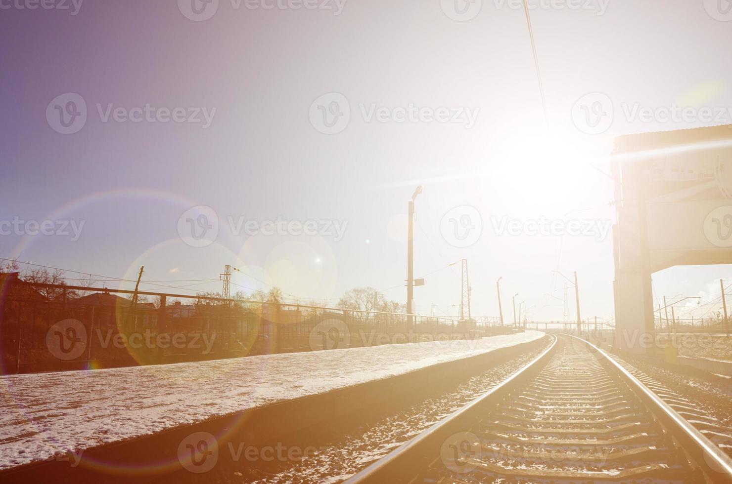 Empty railway station platform photo