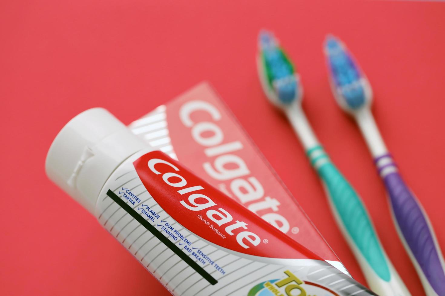 TERNOPIL, UKRAINE - JUNE 23, 2022 Colgate toothpaste and toothbrushes, a brand of oral hygiene products manufactured by American consumer-goods company Colgate-Palmolive photo