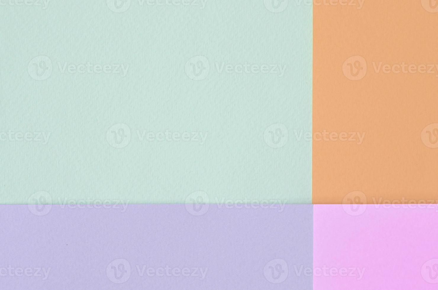 Texture background of fashion pastel colors. Pink, violet, orange and blue geometric pattern papers. photo