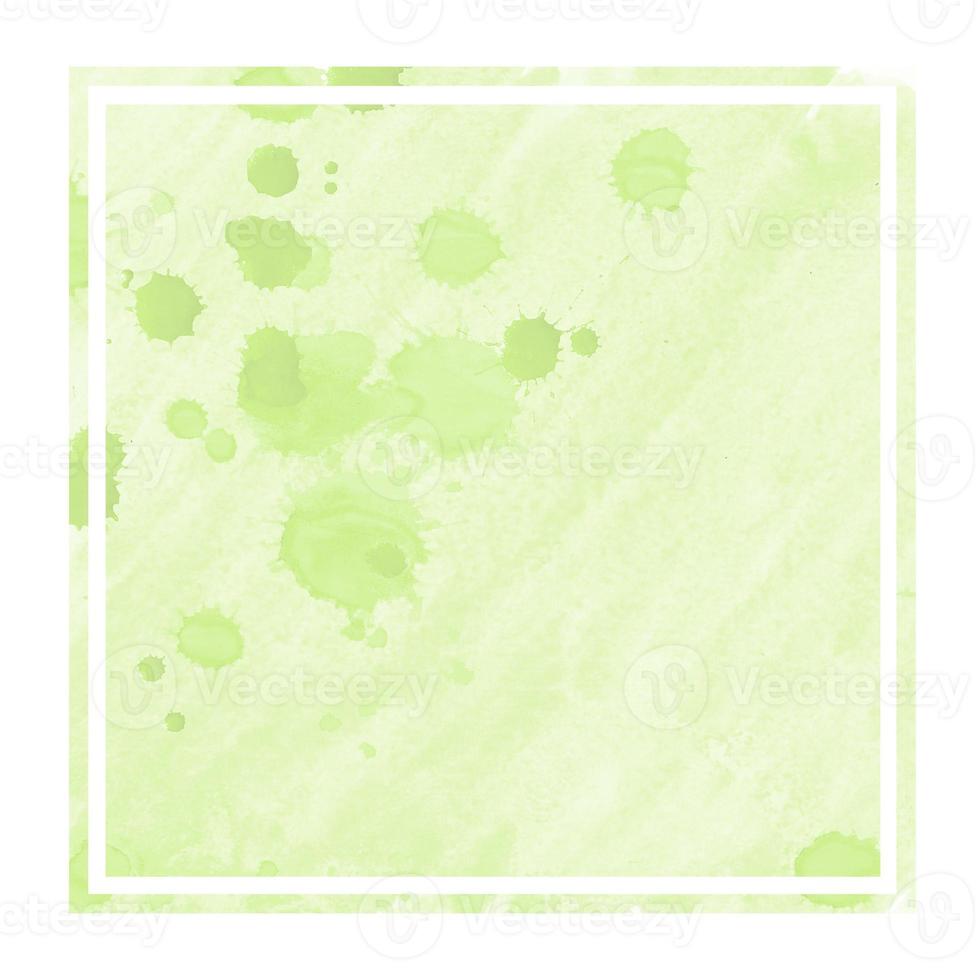 Light green hand drawn watercolor rectangular frame background texture with stains photo