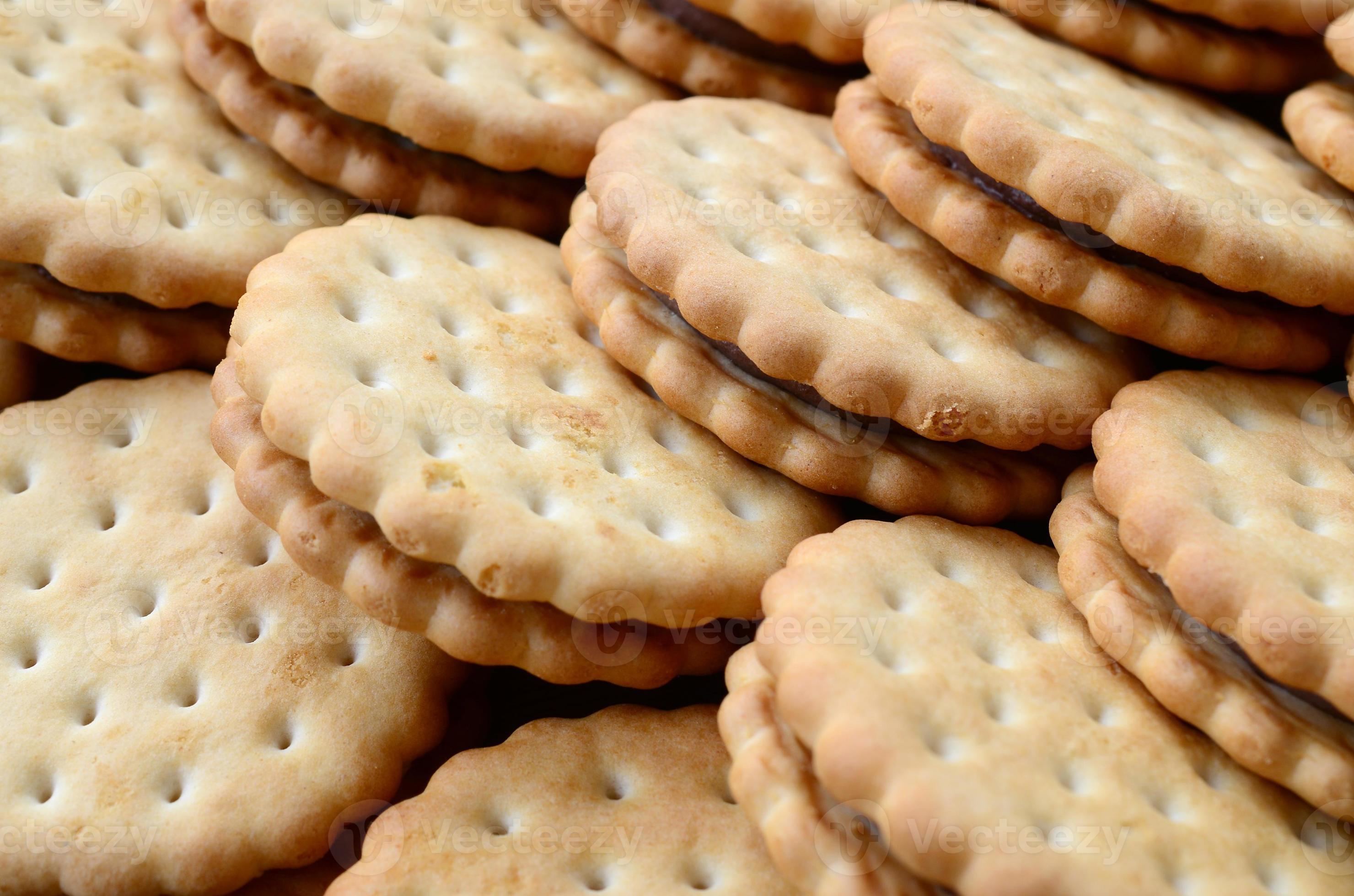 Detailed picture of round sandwich cookies with coconut filling