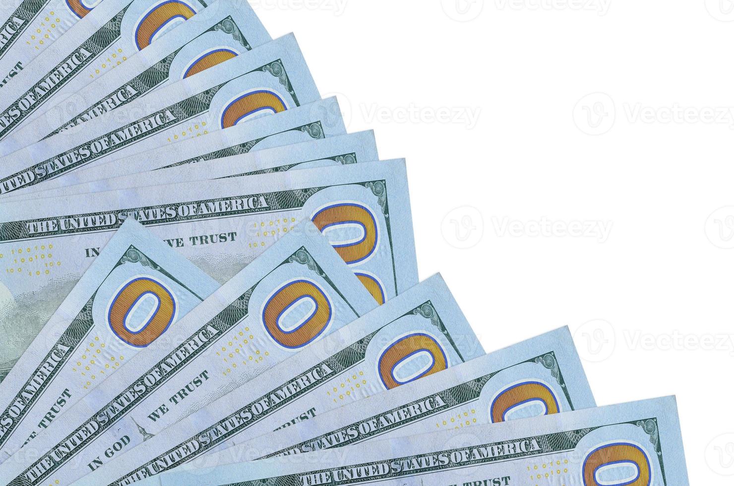 100 US dollars bills lies isolated on white background with copy space stacked in fan close up photo