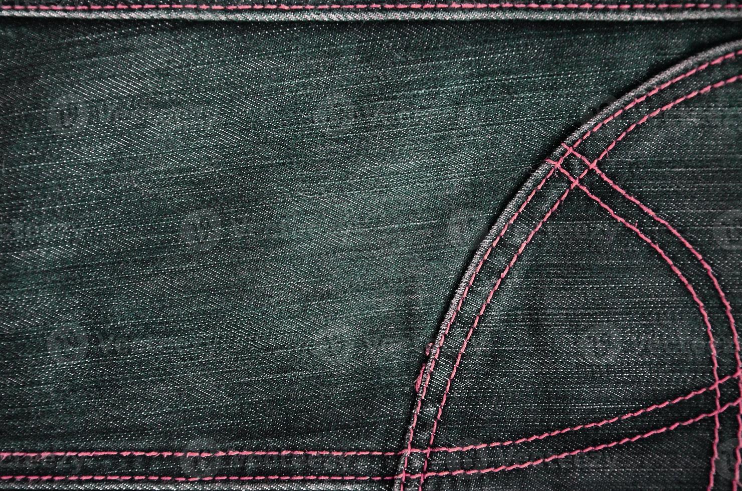 The texture of black denim cloth photo