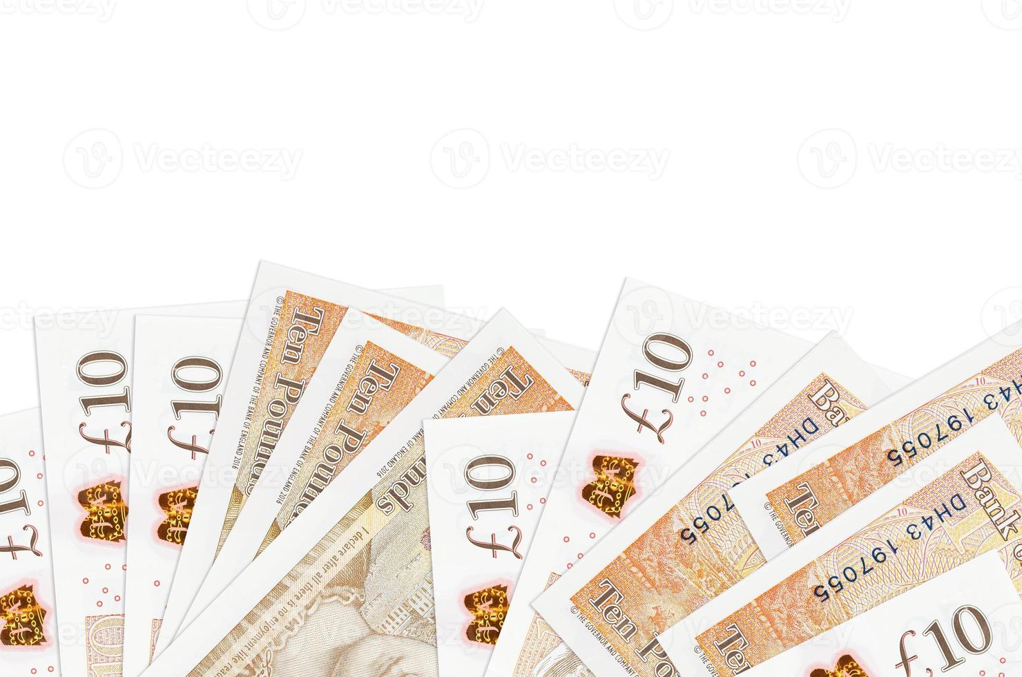 10 British pounds bills lies on bottom side of screen isolated on white background with copy space. Background banner template photo