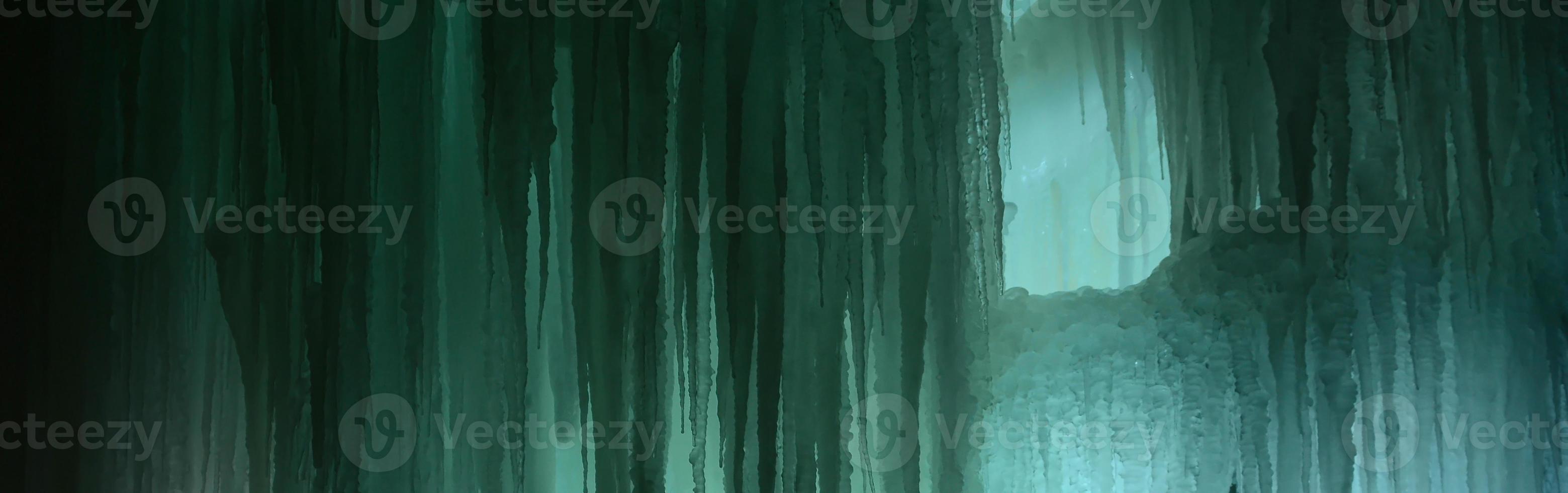 Large blocks of ice frozen waterfall or cavern background photo