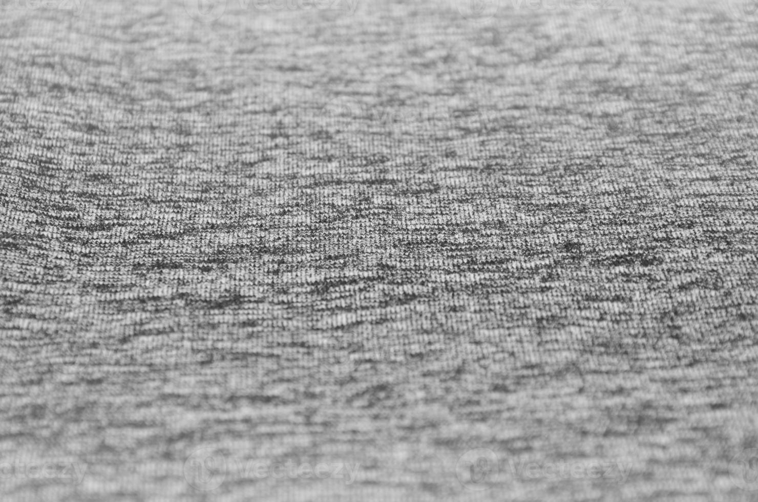 Close-up of heater and knitted jersey fabric textured cloth background with delicate striped pattern photo