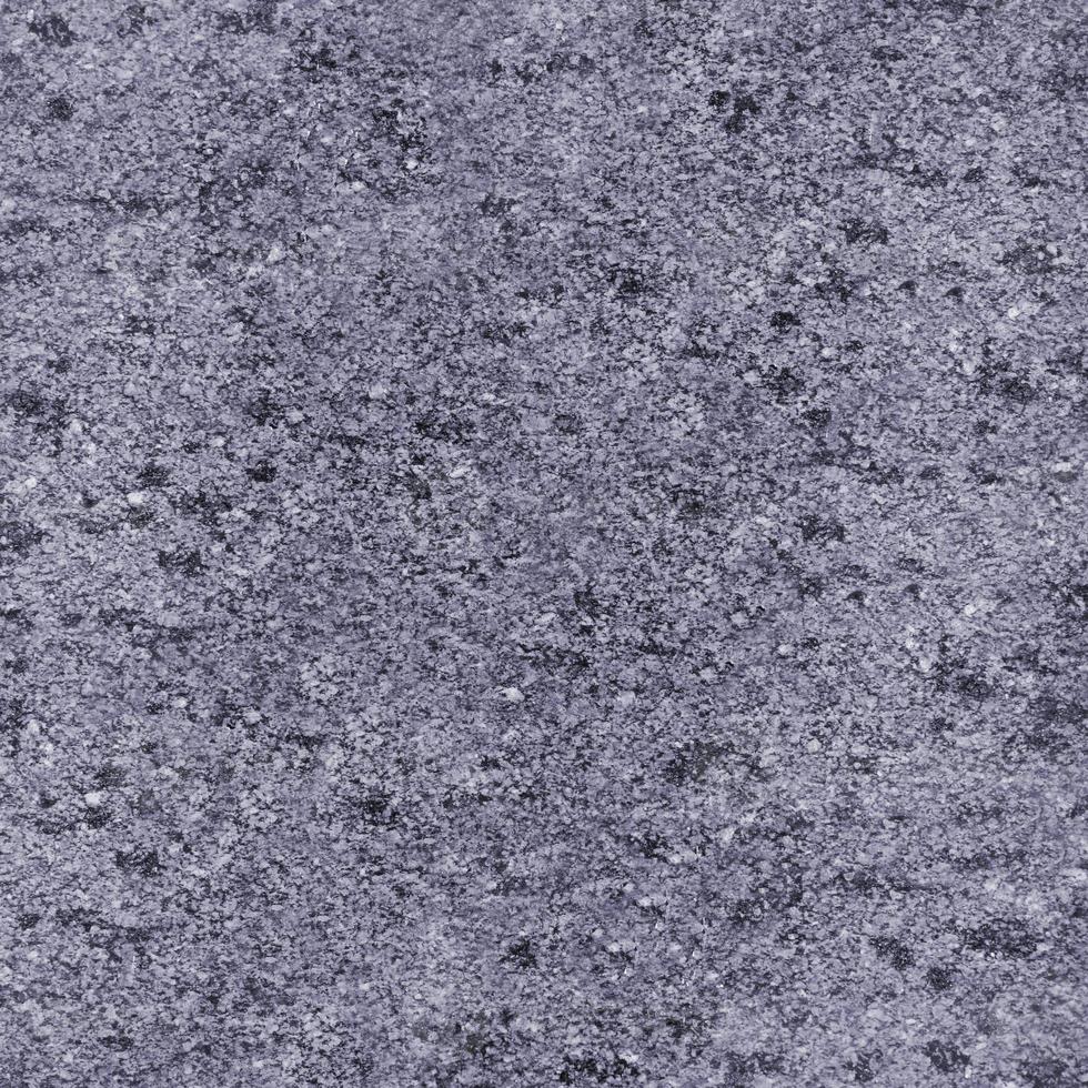 Monochromatic texture of granite surface photo