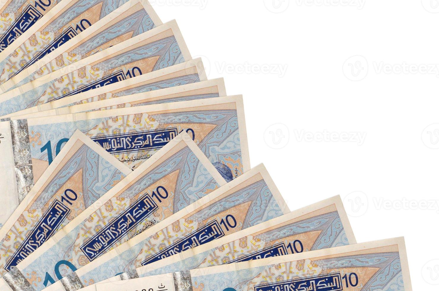 10 Tunisian dinars bills lies isolated on white background with copy space stacked in fan close up photo