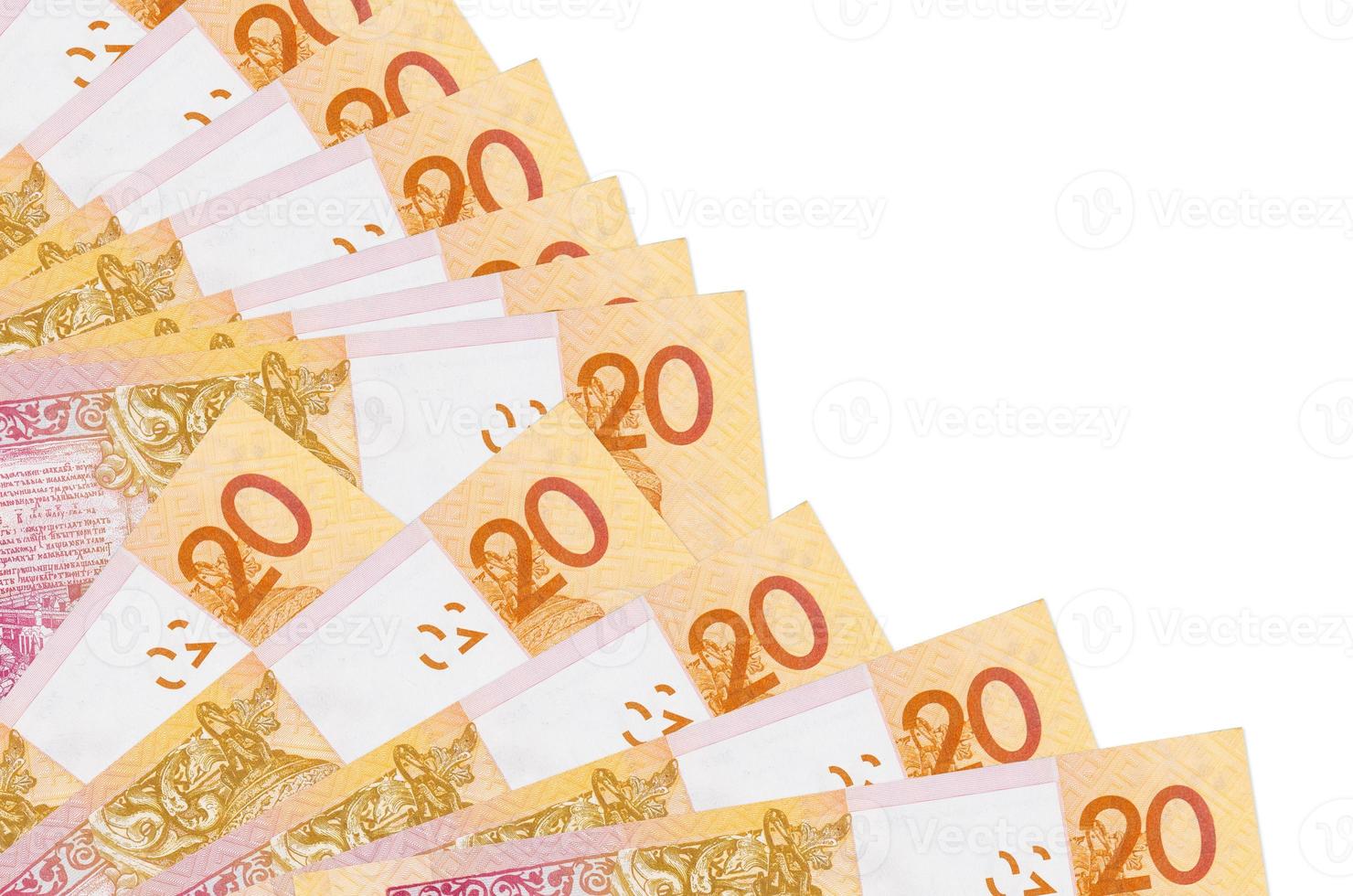20 Belorussian rubles bills lies isolated on white background with copy space stacked in fan close up photo