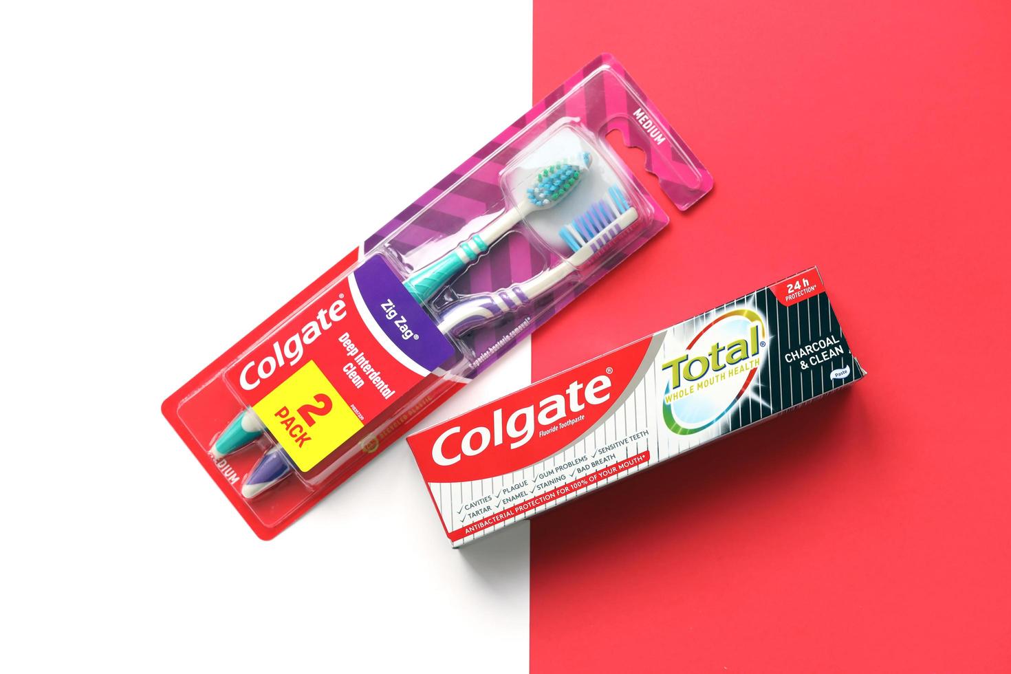 TERNOPIL, UKRAINE - JUNE 23, 2022 Colgate toothpaste and toothbrushes, a brand of oral hygiene products manufactured by American consumer-goods company Colgate-Palmolive photo