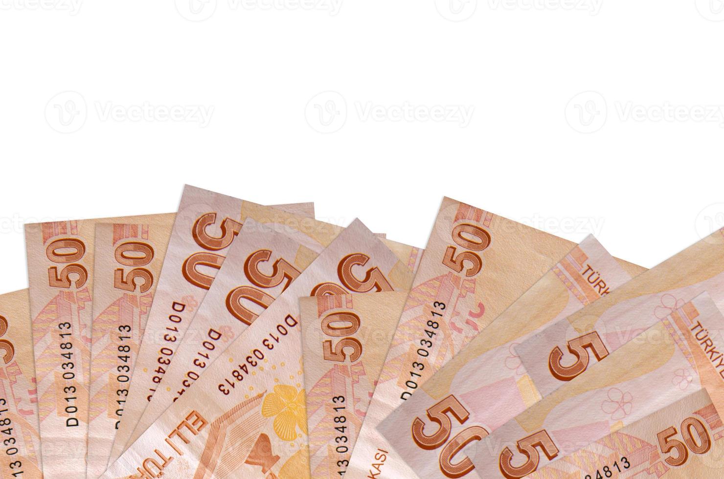 Los billetes de 50 liras turcas se encuentran en la parte inferior de la pantalla aislados en fondo blanco con espacio de copia. plantilla de banner de fondo foto