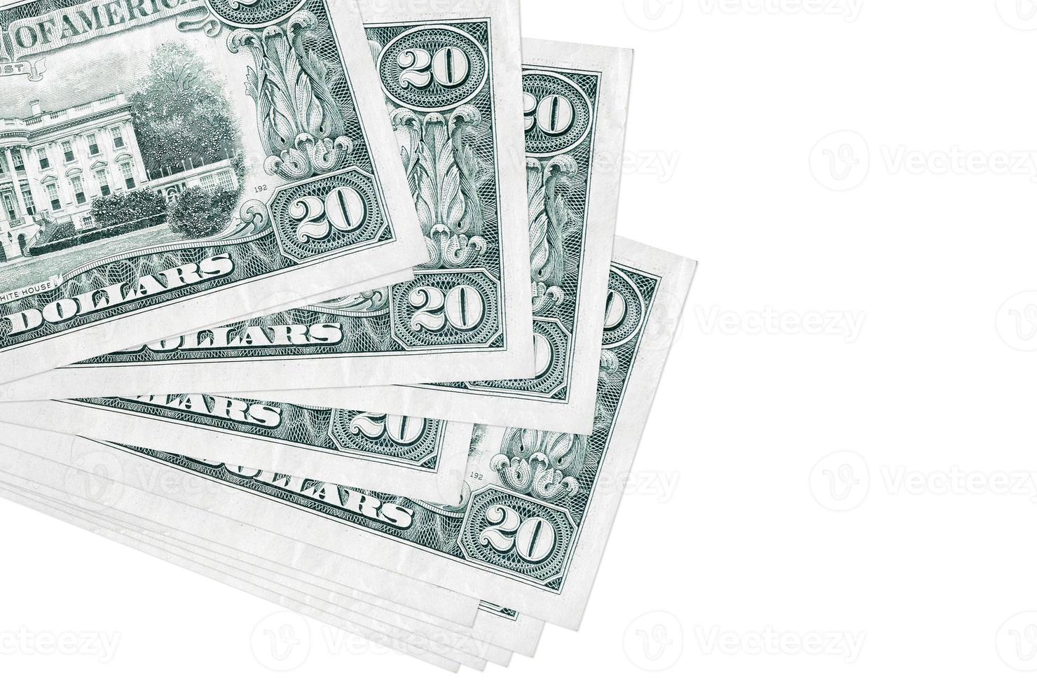 20 US dollars bills lies in small bunch or pack isolated on white. Mockup with copy space. Business and currency exchange photo
