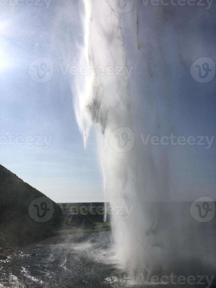 Seljalandsfoss waterfall on the southern coast of Iceland on a sunny day photo