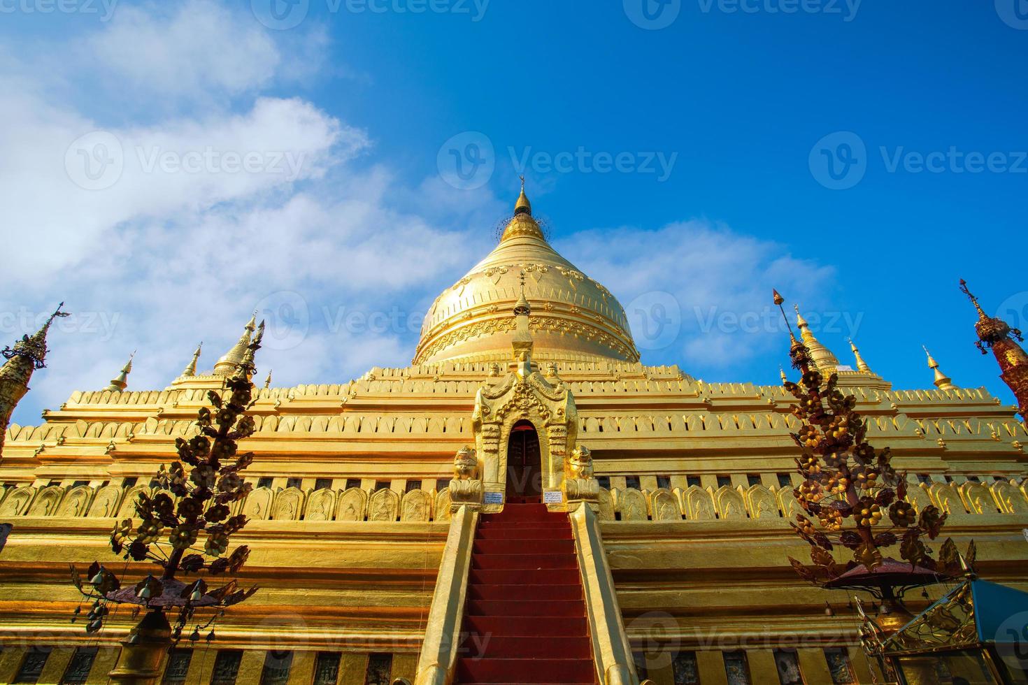 Shwezigon Pagoda, or Shwezigon Paya, a Buddhist temple located in Nyaung-U, a town near Bagan, Mandalay region, Myanmar photo