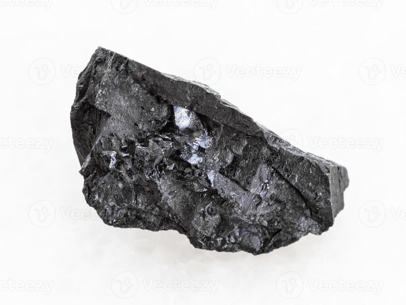 rough Anthracite coal on white marble photo