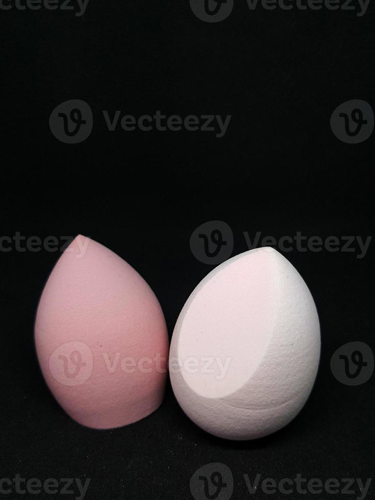 Make up sponge or beauty blender is a tool for applying foundation and other makeup products. photo