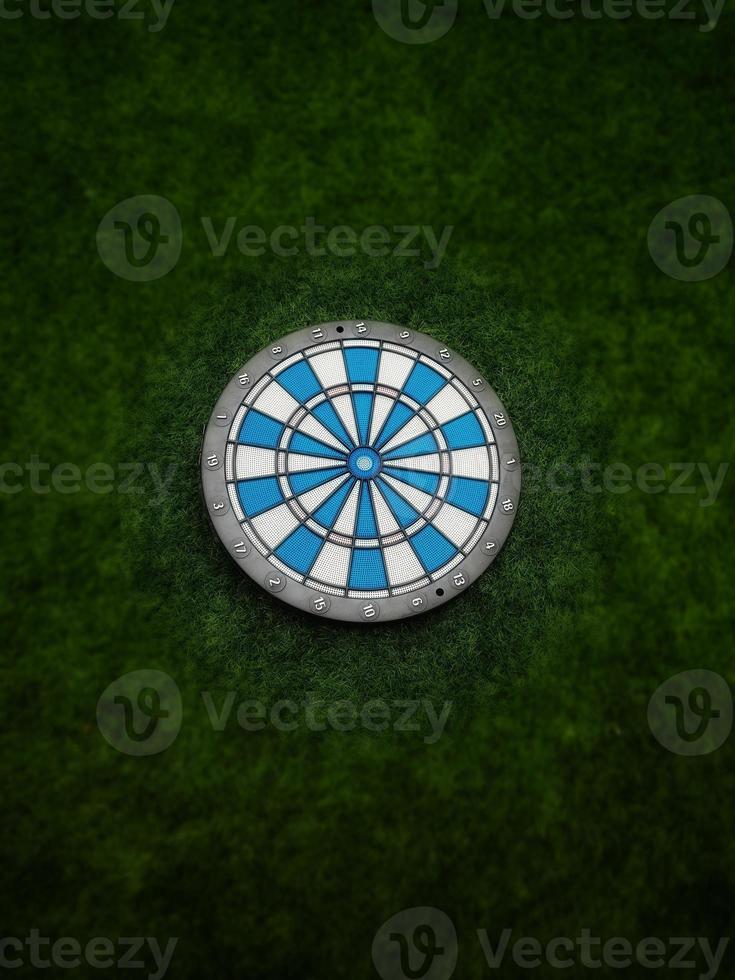 Dart with grass green background. photo