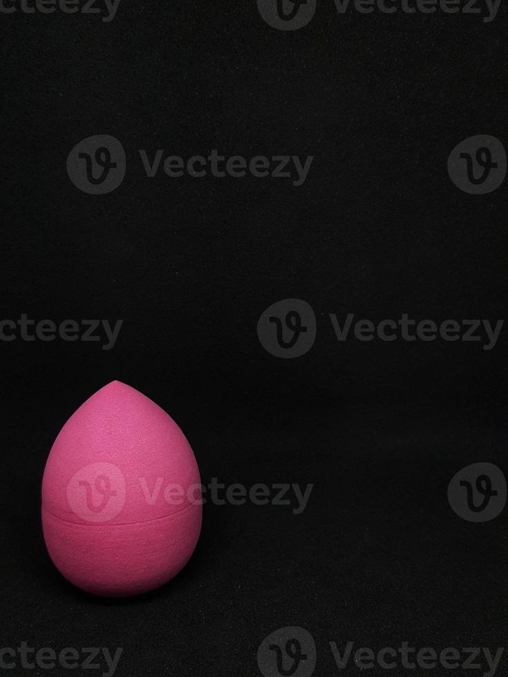 Make up sponge or beauty blender is a tool for applying foundation and other makeup products. photo