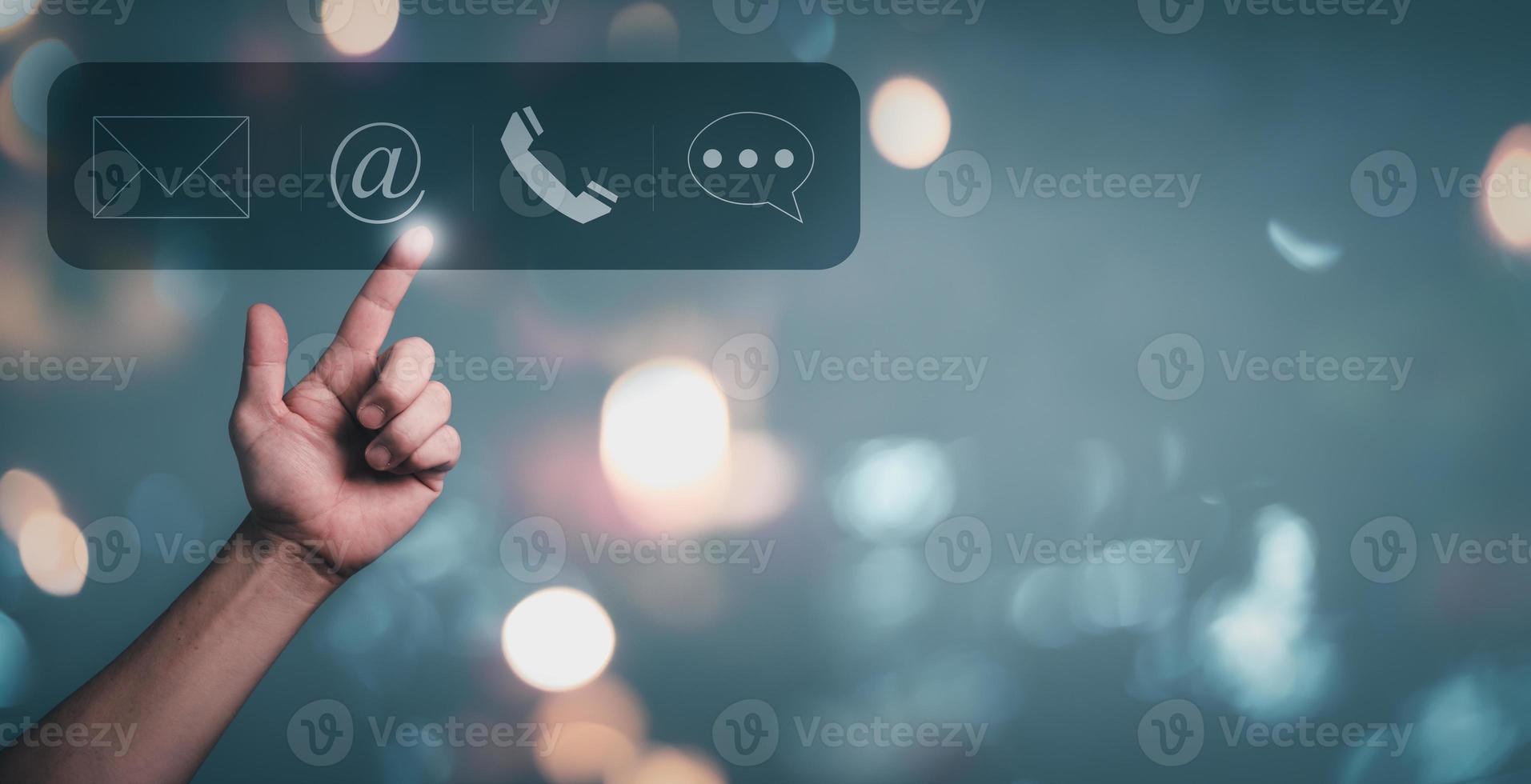 Hand touching on communication customer service contact icon, E-mail, Phone number, Social media group. photo