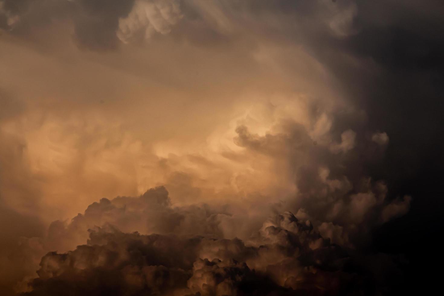 An orange cloud formed a rain cloud one evening photo