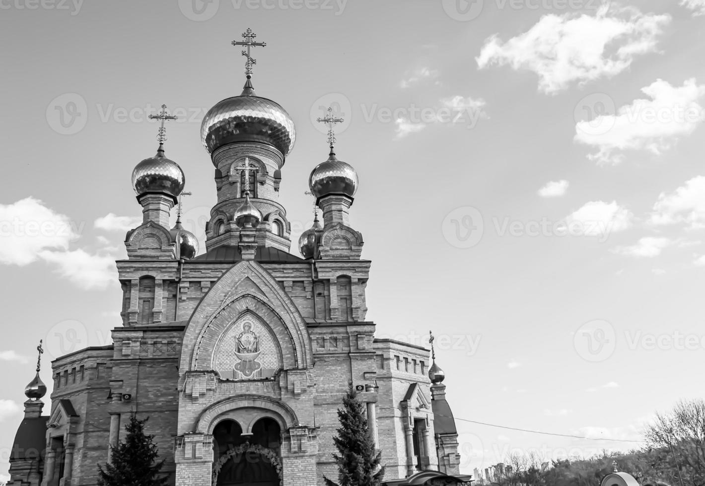 Christian church cross in high steeple tower for prayer photo