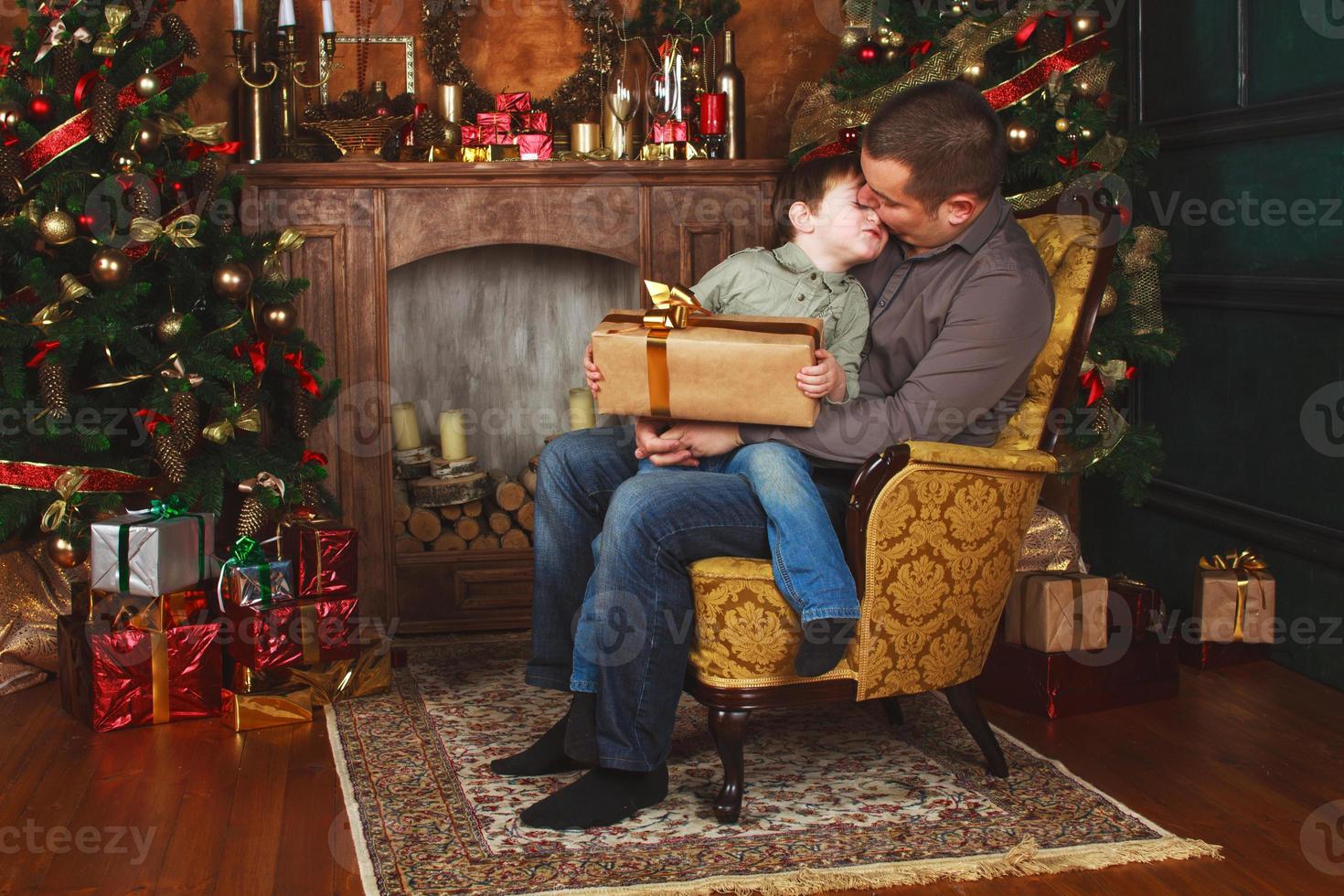 child received a gift from his father photo