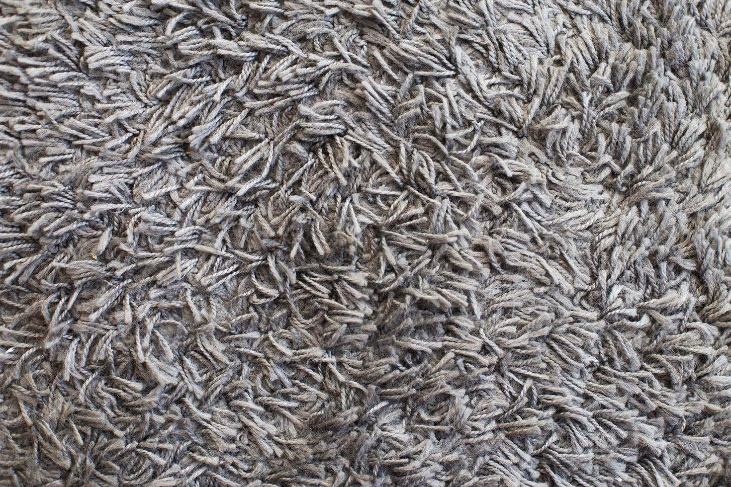The texture of gray carpet. Fleecy surface background photo