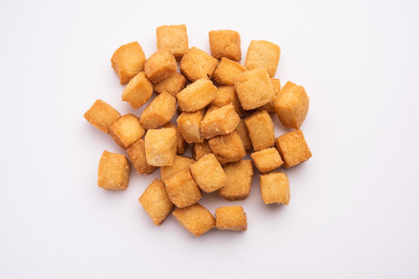 Shankarpali, shakkarpara, murali, khurma, lakdi mithai, or simply mithai is an Indian sweet snack photo