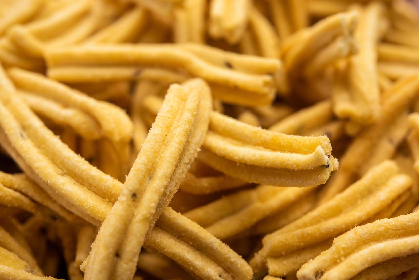 Ganthiya are deep fried Indian snacks made from chickpea flour photo