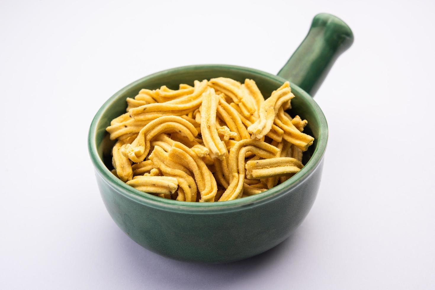 Ganthiya are deep fried Indian snacks made from chickpea flour photo