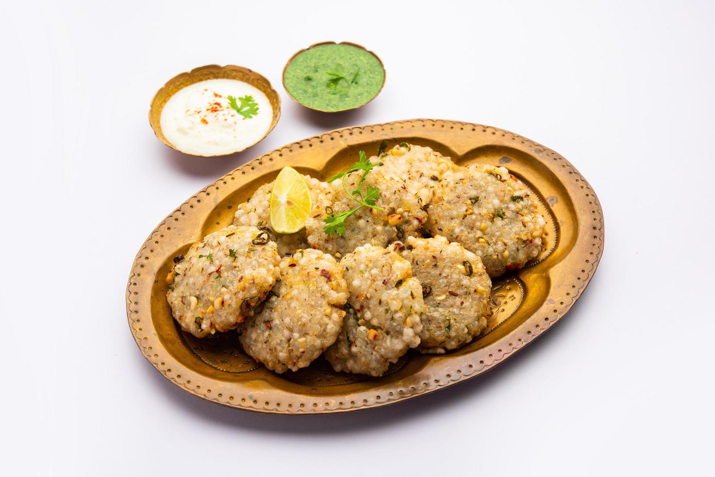 sabudana wada or shabudana vada called in india made from sago and served with chutney photo