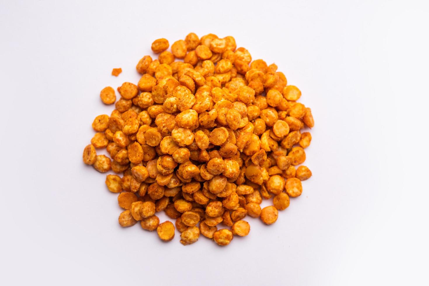 Fried and Spicy Chana Dal Masala namkeen is a popular Chakna recipe. served in a bowl photo