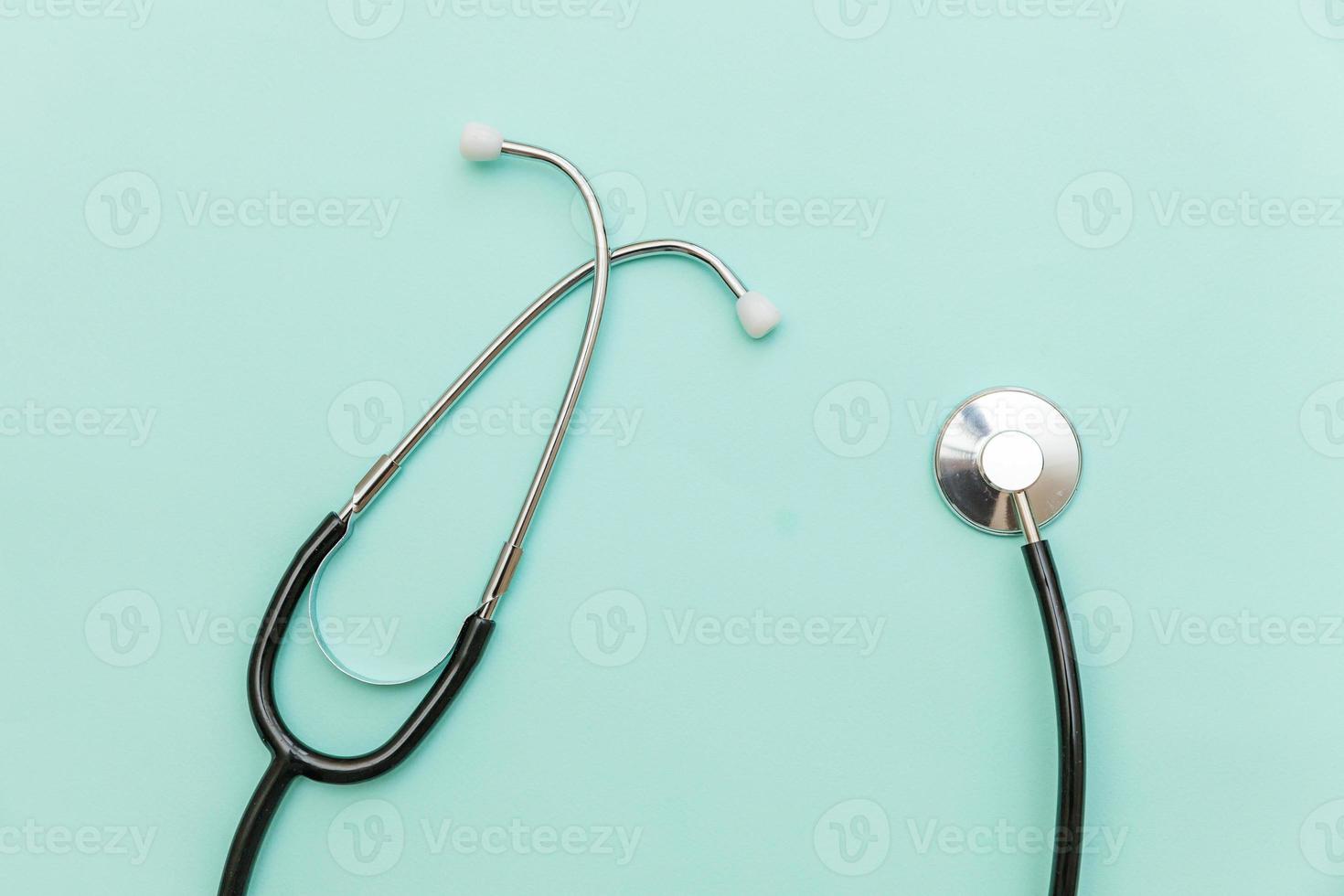 Medicine equipment stethoscope or phonendoscope isolated on trendy pastel blue background. Instrument device for doctor. Health care life insurance concept photo