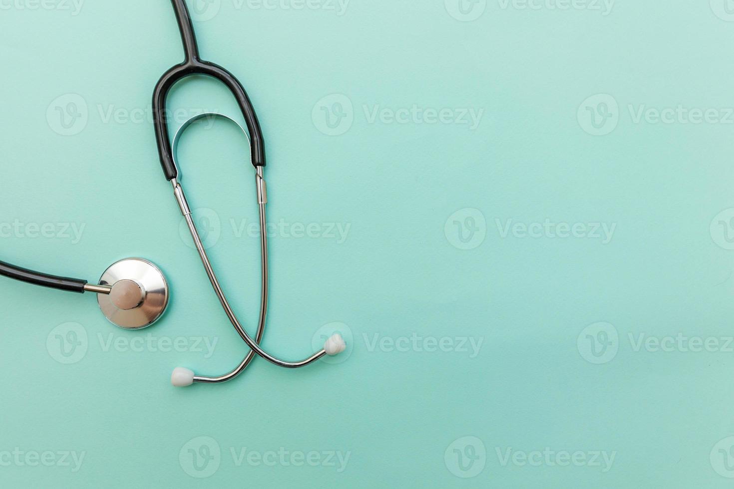 Medicine equipment stethoscope or phonendoscope isolated on trendy pastel blue background. Instrument device for doctor. Health care life insurance concept photo