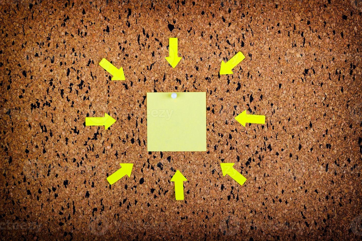 sticky note on cork board, empty space for text photo