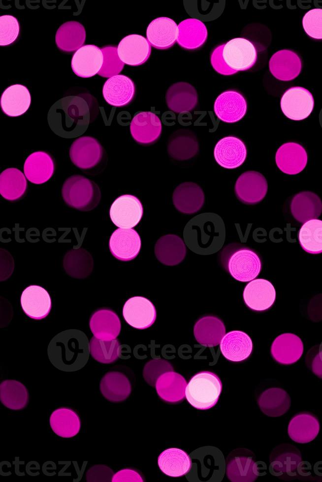fondo púrpura bokeh colorido abstracto desenfocado. desenfocada y borrosa muchas luces violetas redondas foto