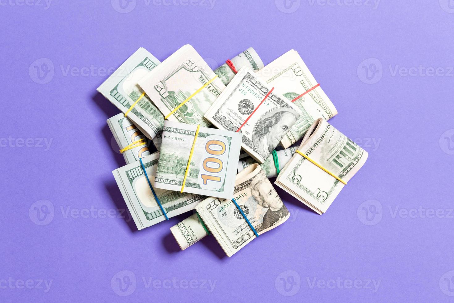 US Dollar bills bundles stack. one hundred dollar bills with stack of money in the middle. Top view of business concept on background with copy space photo