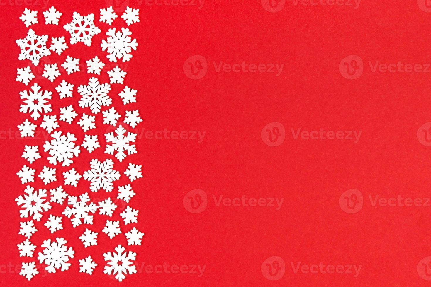 Set of white snowflakes on colorful background. Top view of Christmas ornament. New Year time concept with empty space for your design photo