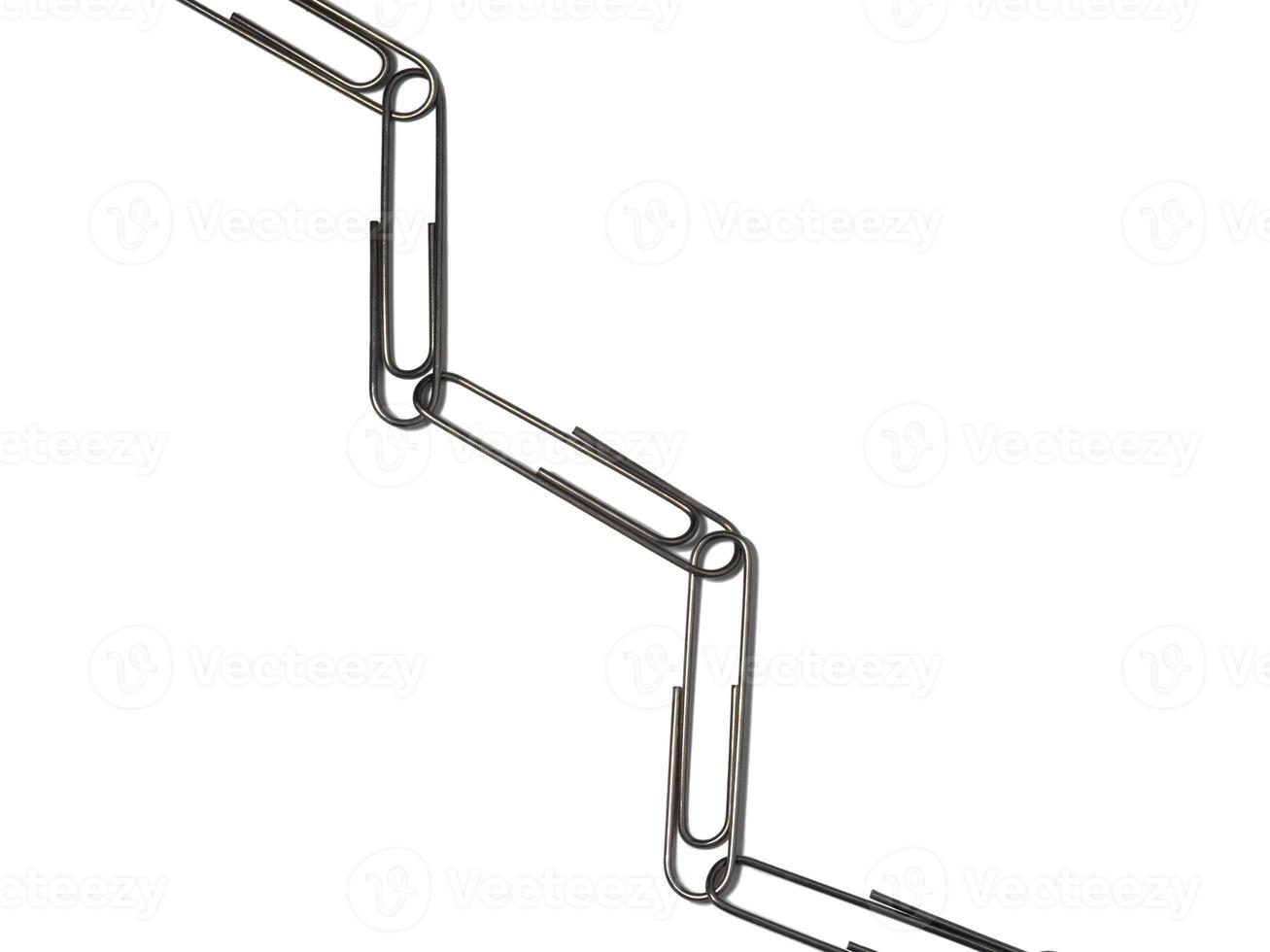 Large paper clips on a white background. Office supplies isolate. Paper clips. photo